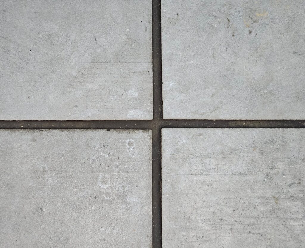The dark grout is in contrast