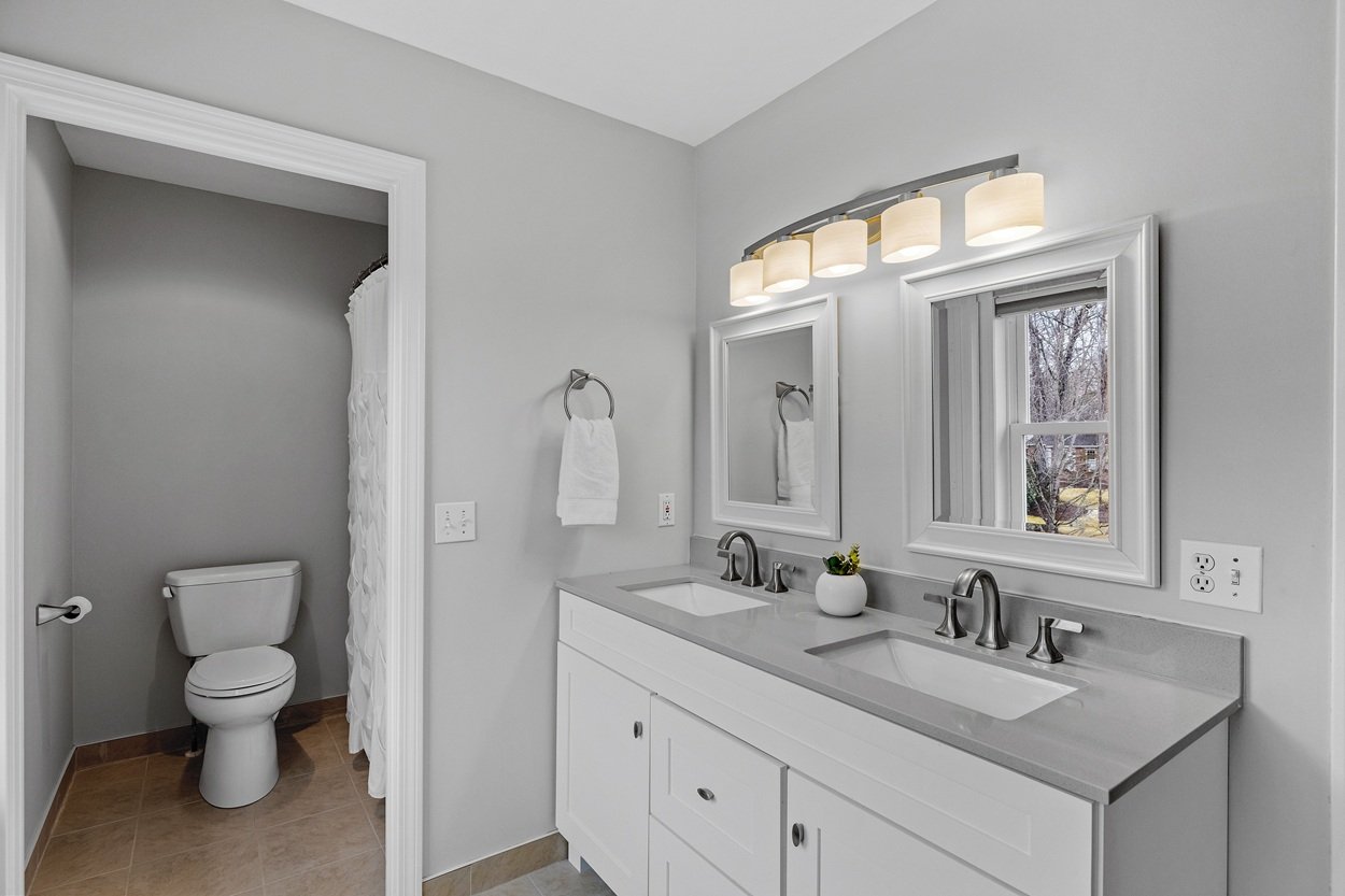 Historic bathroom renovation in Washington DC townhouse with restored til