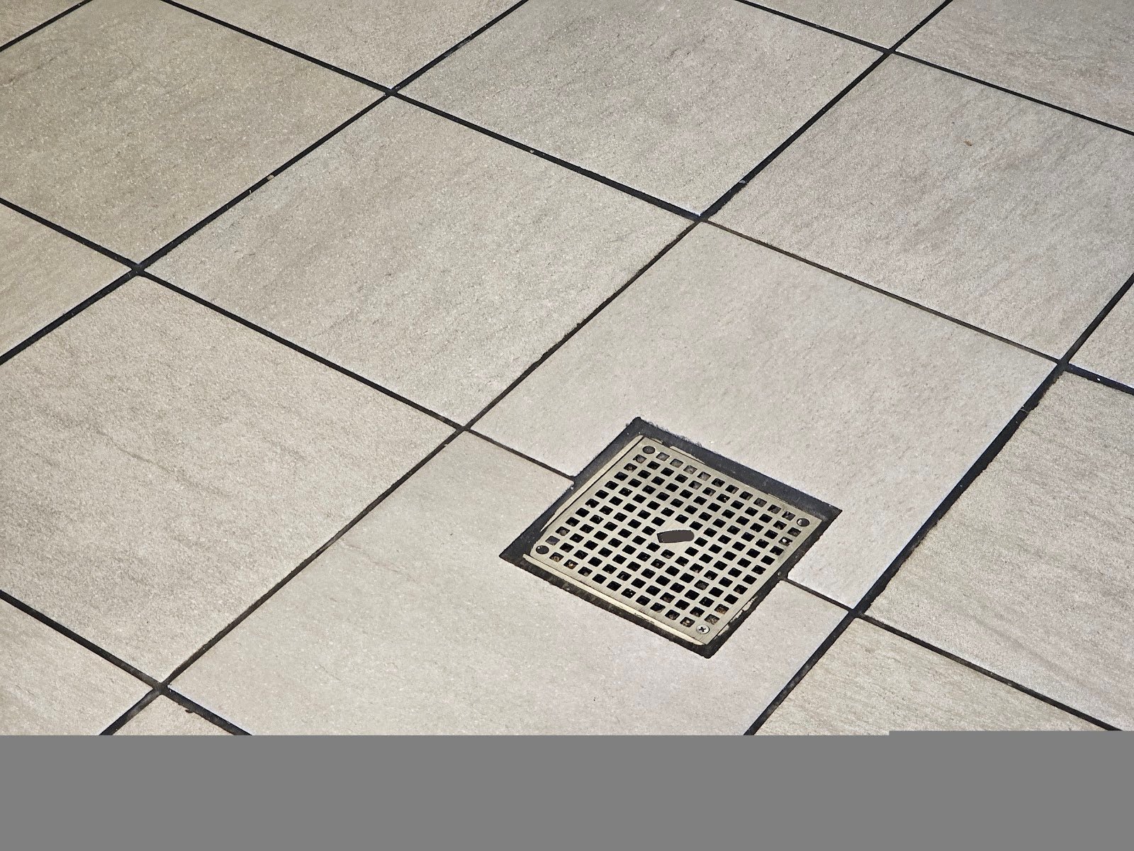 Floor drains installed in ceramic tile bathroom Washington, DC