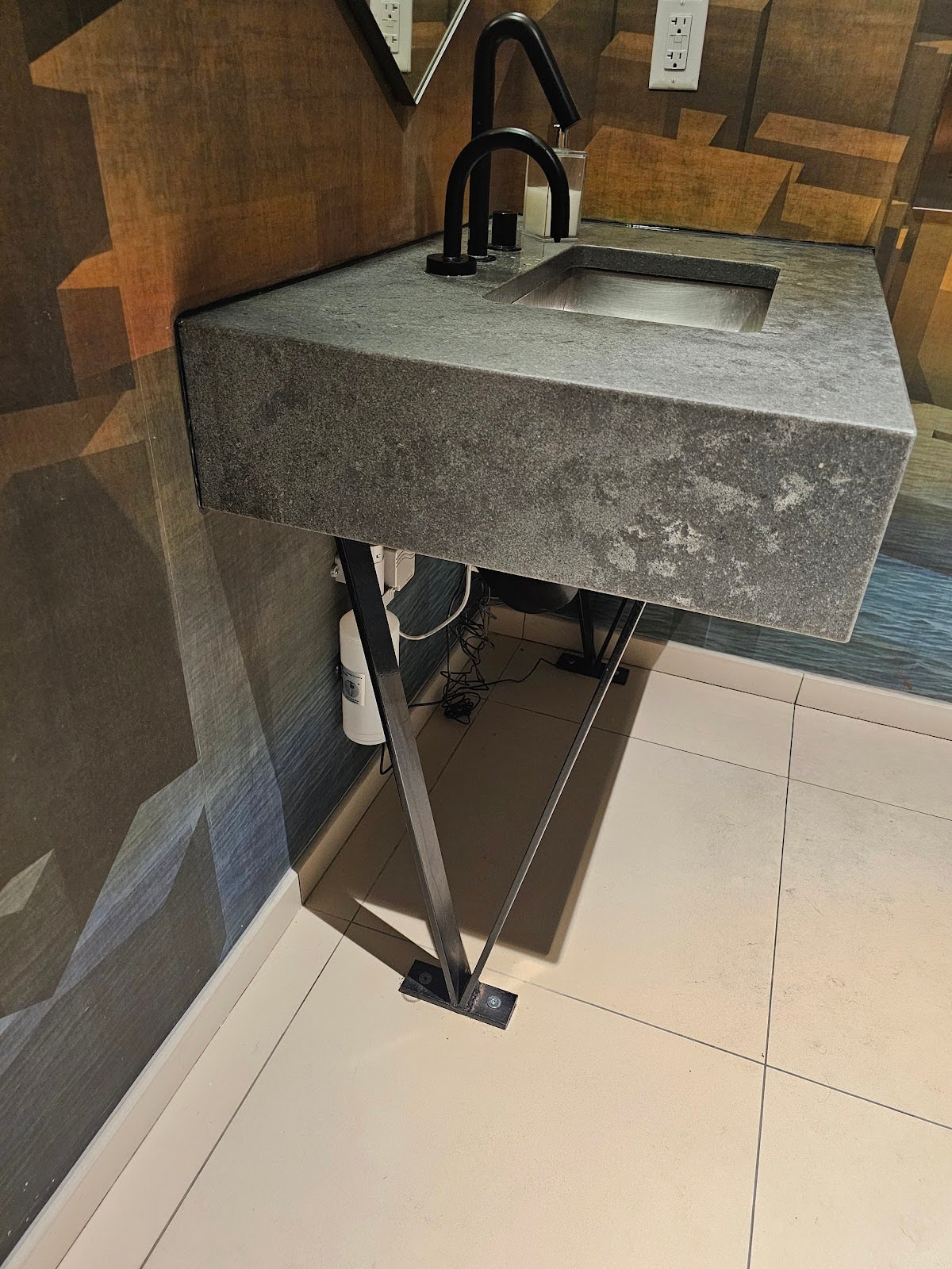 Bathroom featuring chiaroscuro design elements with light and dark contrast