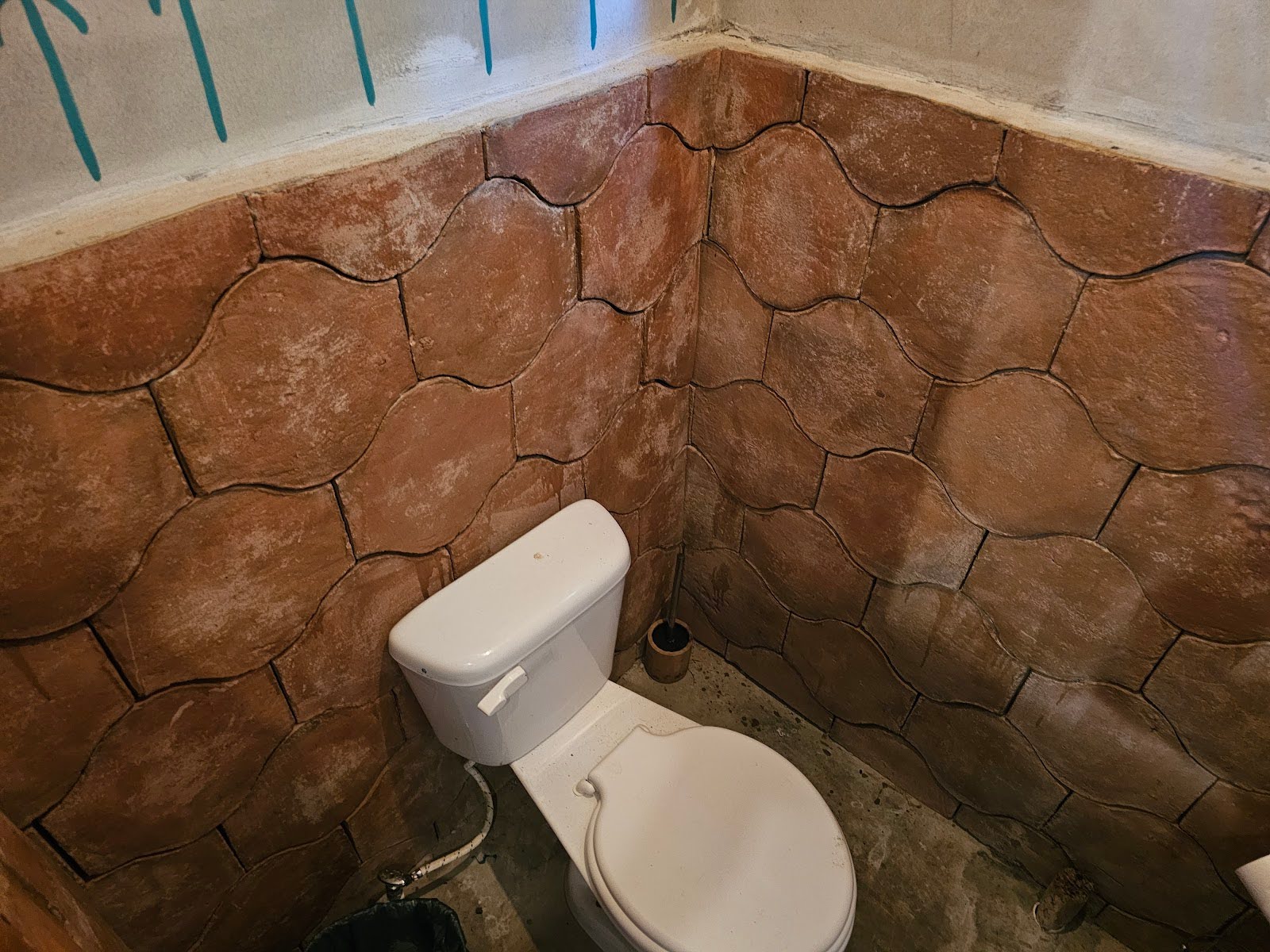 Terracotta Wall Tile in a Rustic Bathroom Design