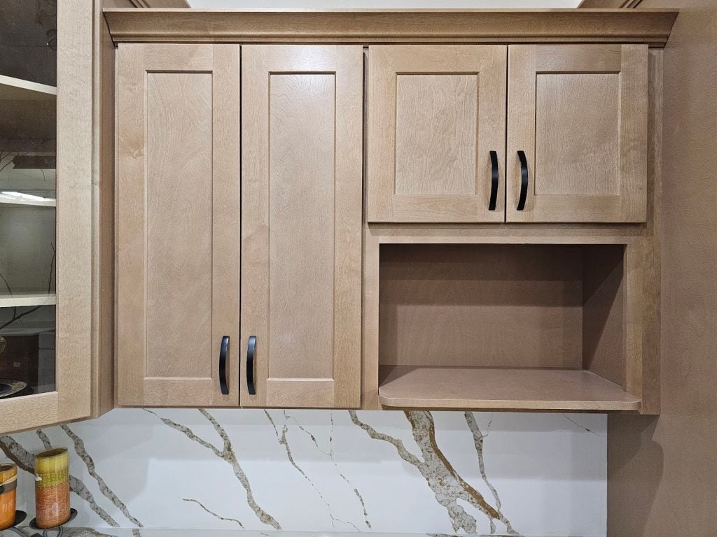 Custom natural wood grain shaker cabinets installed in a residential kitchen