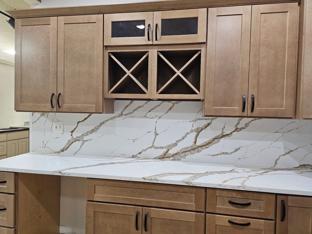 Natural wood grain shaker style kitchen cabinets in a modern kitchen design