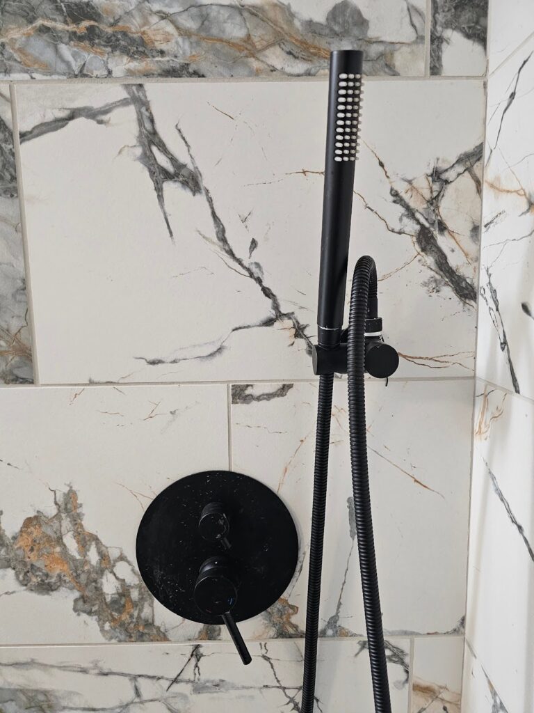 the shower controls with the wall mounted