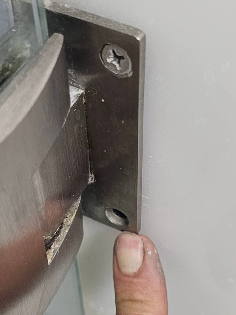 kitchen after flip with punchlist repairs on cabinets countertops and lighting