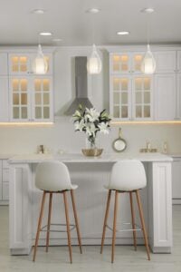 Updated kitchen design with new lighting, durable flooring, and stylish cabinet hardware in Maryland