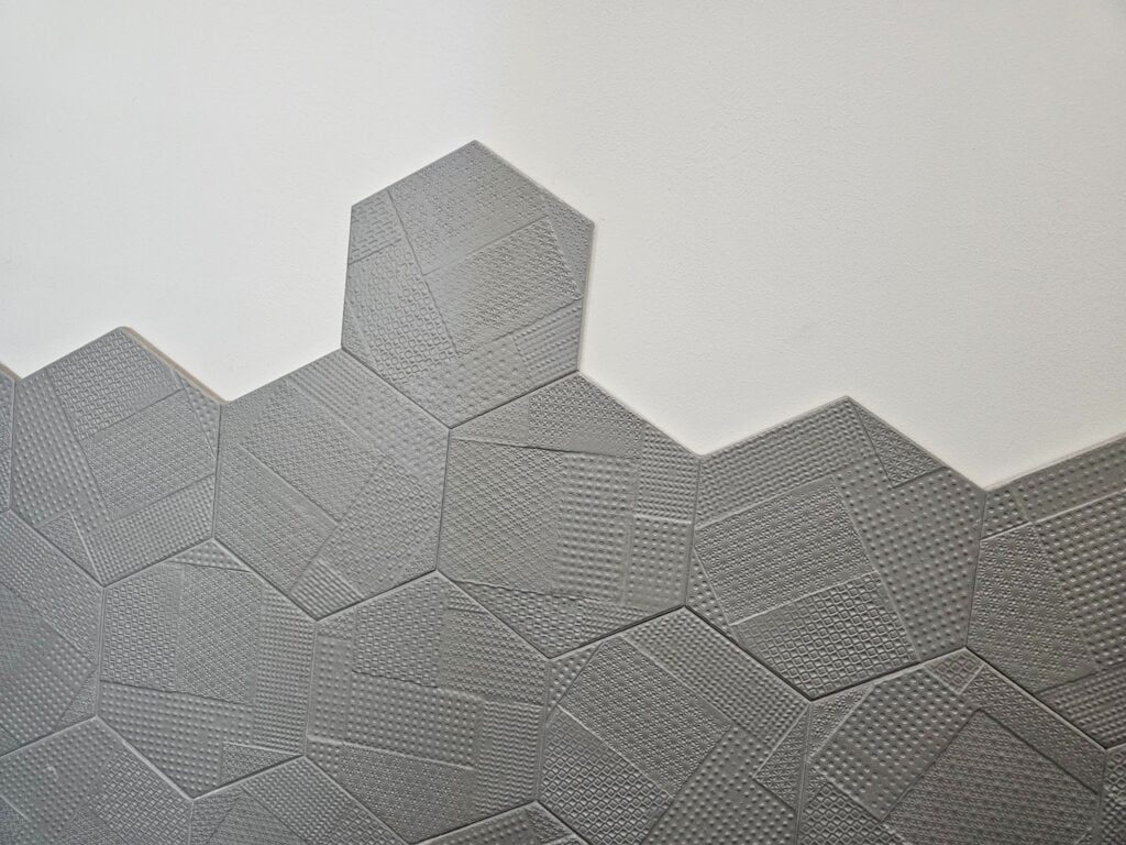 Close-up of decorative hex wall tiles in a contemporary interior