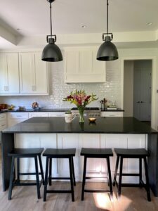 Modern kitchen remodeling project in Montgomery County featuring updated cabinets, countertops, and lighting