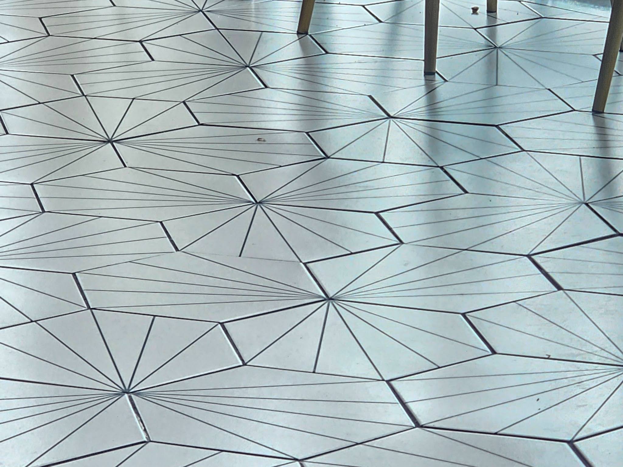 Art Deco style hex tile pattern with geometric decorative design