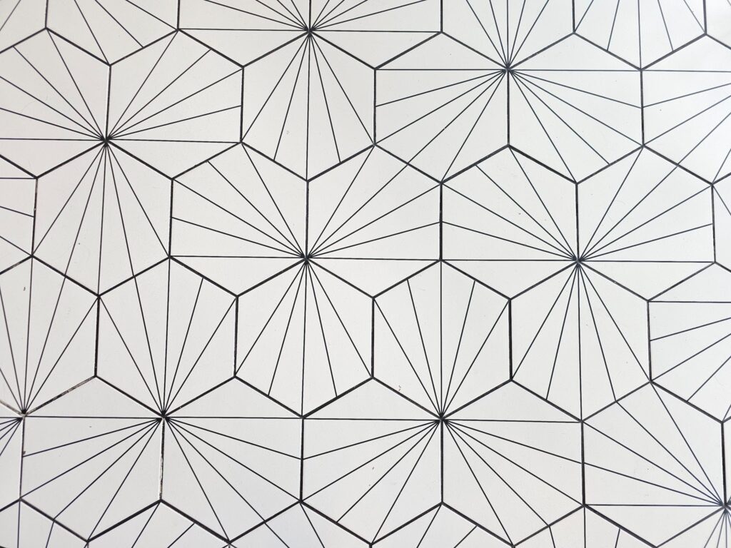 Close-up of Art Deco hexagonal tiles arranged in a geometric pattern