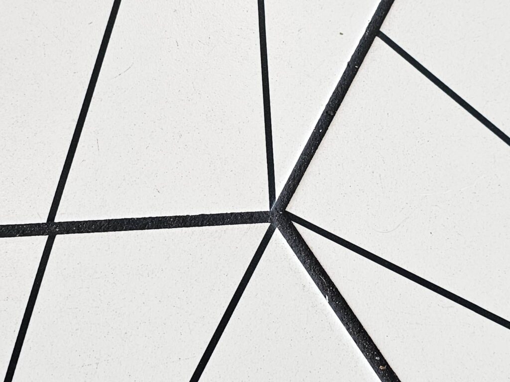 Geometric Art Deco style hex tiles creating a detailed patterned surface
