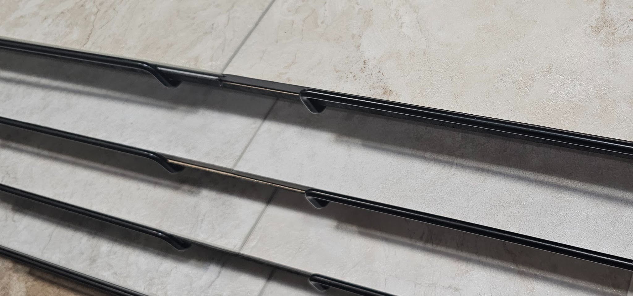 Professional installation of large format porcelain wall tiles by Infinity Design Solutions in Washington, DC