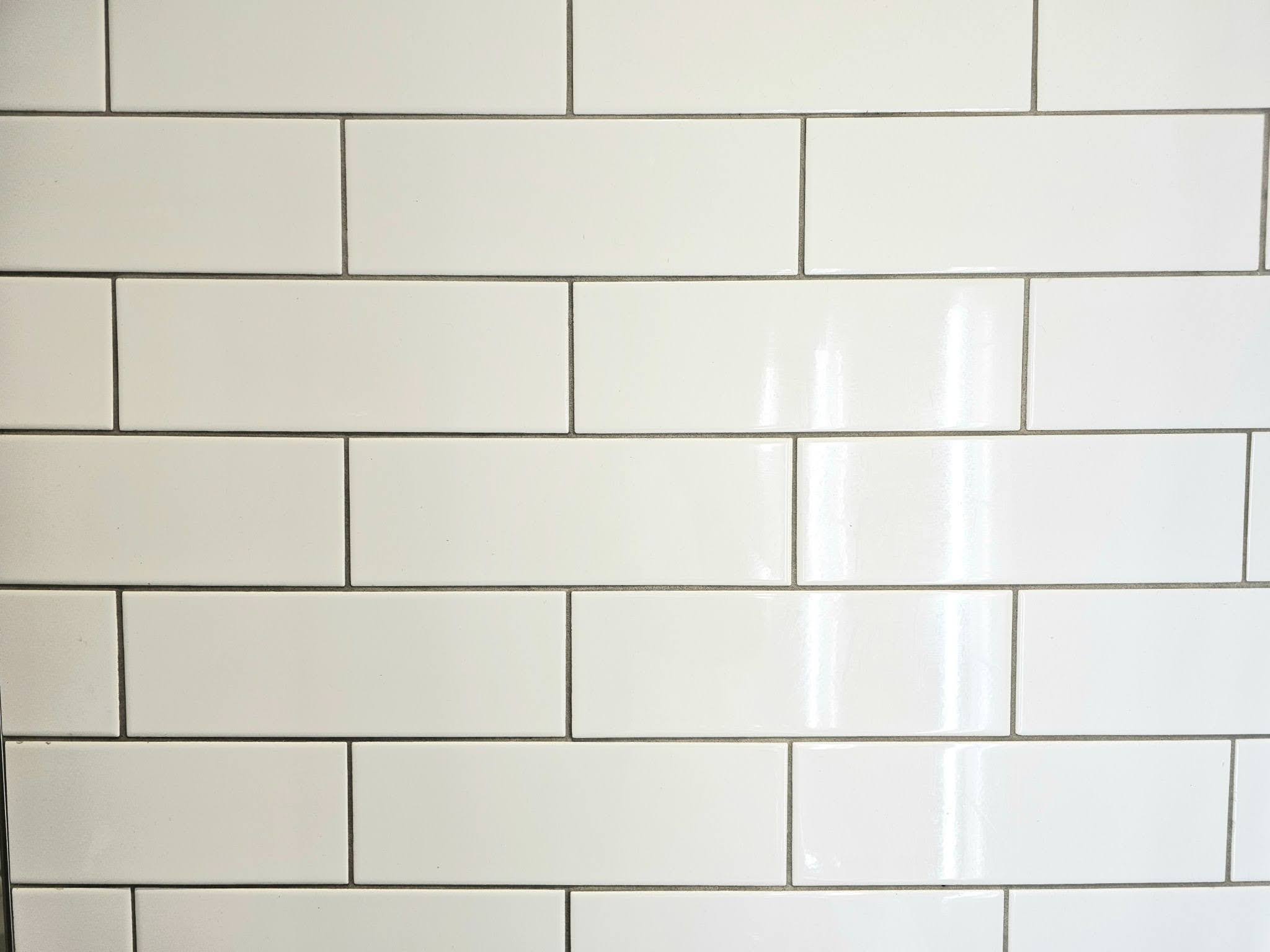 White subway tile walls in a modern bathroom